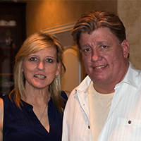 With his wife, Brenda